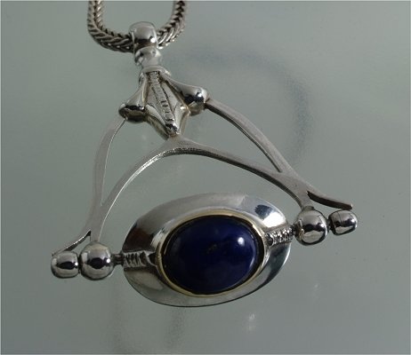 Alternating sterling silver, gold, lapis lazuli & turquoise pendant 